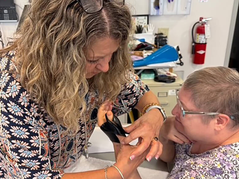 Donna working with a patient.
